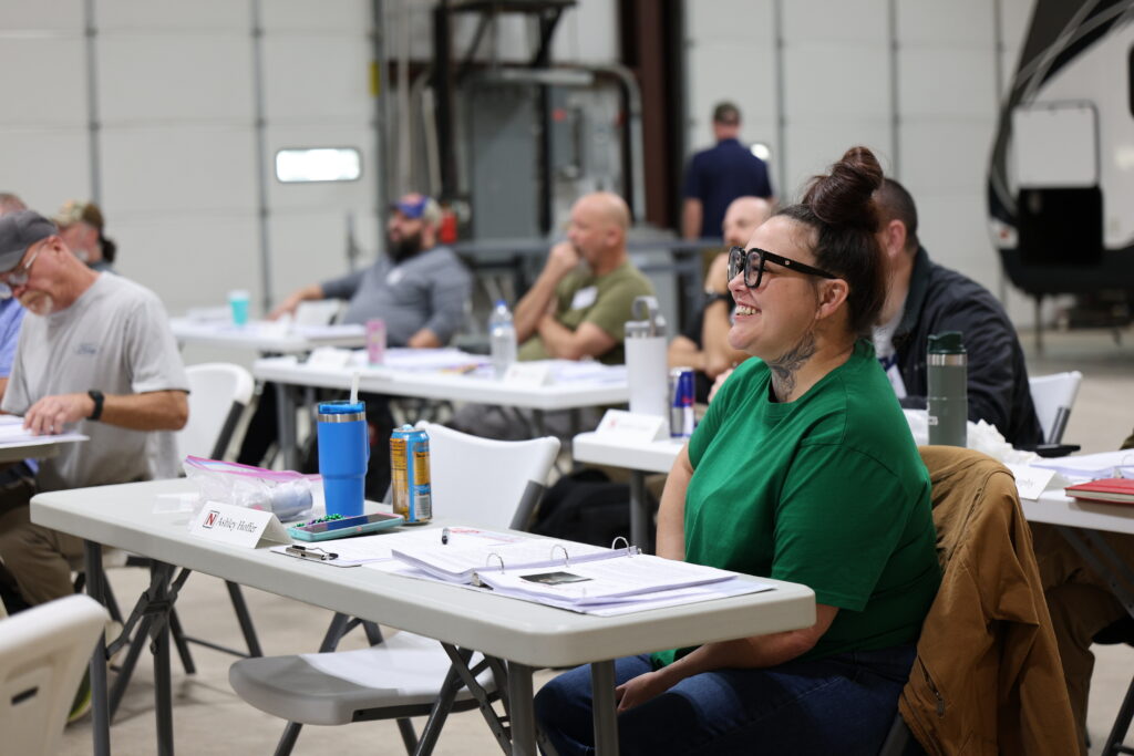 Student learning hands-on RV technician training at the National RV Training Academy.