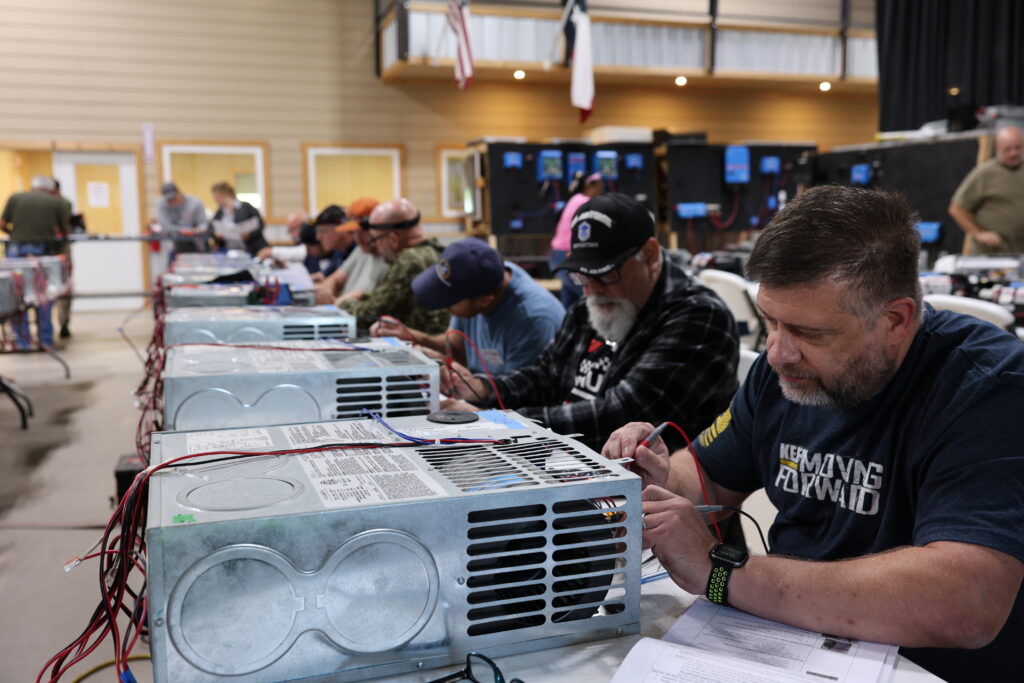 Student learning hands-on RV technician training at the National RV Training Academy.